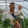 Our Polytunnel – before and after photos Ben and Aisling in Polytunnel