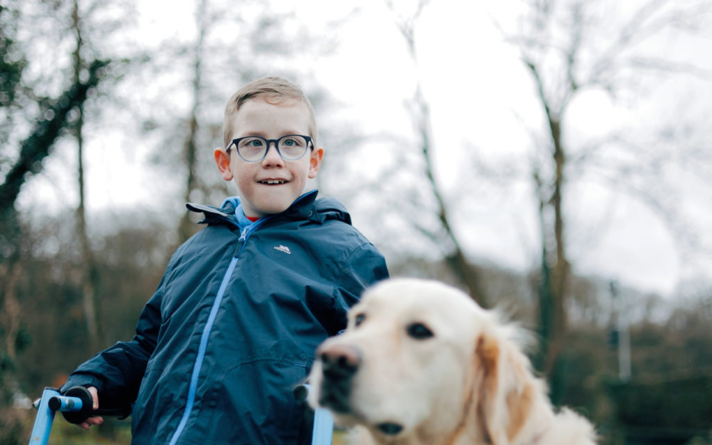 Oliver Lynch with His assistance dog Mo