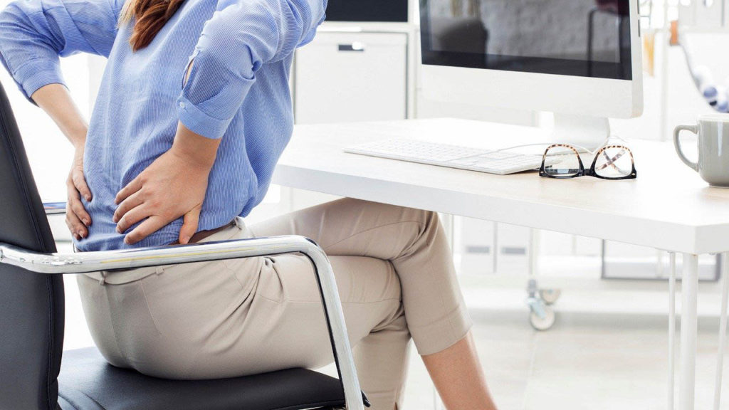 Avoid Back Pain - Seated Person in pain