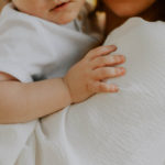 The Advantage of Chiropractic Care from a A young age - Mother holding baby